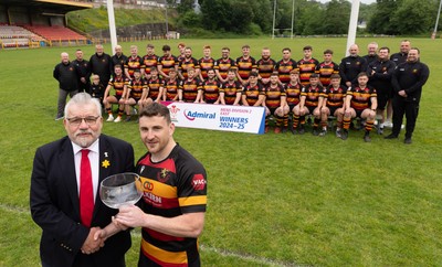 290525 - Blackwood RFC League Presentation - Blackwood RFC captain Josh Law is presented with the trophy by WRU representative Bryn Parker after winning the Admiral League Mens Division 2 East title