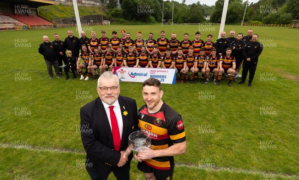 290525 - Blackwood RFC League Presentation - Blackwood RFC captain Josh Law is presented with the trophy by WRU representative Bryn Parker after winning the Admiral League Mens Division 2 East title