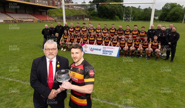 290525 - Blackwood RFC League Presentation - Blackwood RFC captain Josh Law is presented with the trophy by WRU representative Bryn Parker after winning the Admiral League Mens Division 2 East title