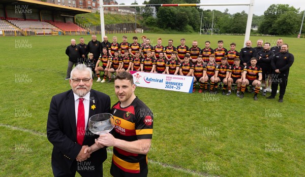 290525 - Blackwood RFC League Presentation - Blackwood RFC captain Josh Law is presented with the trophy by WRU representative Bryn Parker after winning the Admiral League Mens Division 2 East title