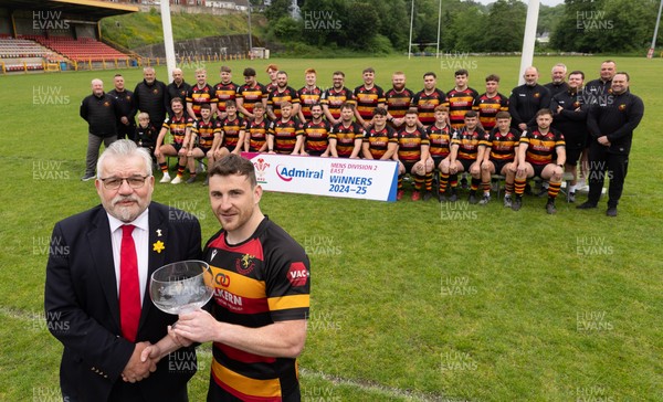 290525 - Blackwood RFC League Presentation - Blackwood RFC captain Josh Law is presented with the trophy by WRU representative Bryn Parker after winning the Admiral League Mens Division 2 East title