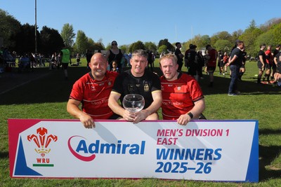 250426 - Blaina v Bedlinog - Admiral National League 1 East - Blaina RFC captains Michael John (middle in black), Tomas Speary (l) & Cobi Edwards (vice captain on right), with trophy after winning the league
