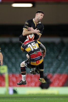 120426 - Blaina v Abercrave - Mens Division One Cup Final - Richard Powell of Blaina is tackled by Steffan Castle