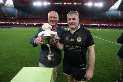 120426 - Blaina v Abercrave - Mens Division One Cup Final - Michael John is presented the trophy by WRU president Terry Cobner
