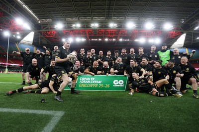 120426 - Blaina v Abercrave - Mens Division One Cup Final - Michael John lifts the trophy alongside team mates