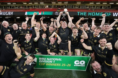120426 - Blaina v Abercrave - Mens Division One Cup Final - Michael John lifts the trophy alongside team mates