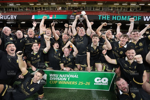 120426 - Blaina v Abercrave - Mens Division One Cup Final - Michael John lifts the trophy alongside team mates