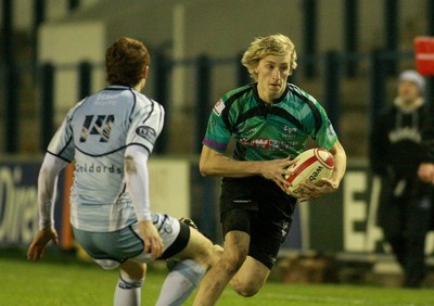 290212 Cardiff Blues South U16 v Ospreys U16 - Regional Age Grade Competition Final -Ospreys' Jordan Addereley takes on Blues' Ellis Wyn Benham 