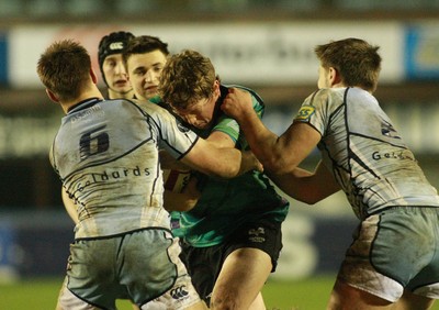 290212 Cardiff Blues South U16 v Ospreys U16 - Regional Age Grade Competition Final -Ospreys' Harrison Walsh charges at the Blues' defense