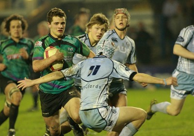 290212 Cardiff Blues South U16 v Ospreys U16 - Regional Age Grade Competition Final -Ospreys' Joe Thomas takes on Blues' Joseph Williams