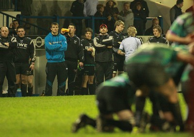 290212 Cardiff Blues South U16 v Ospreys U16 - Regional Age Grade Competition Final -Ospreys' Tom Smith(blue top) overlooks matters on the field