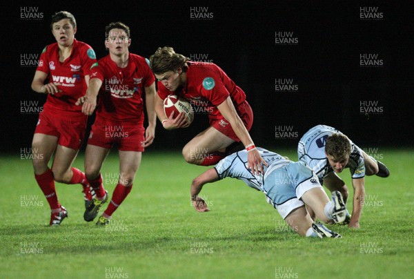 14.09.11 - Cardiff Blues U18's v Scarlets U18's - Age Grade Regional Championship -  Scarlets' Steff Hughes is tackled by Blues' Rhys Woodman  