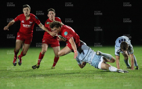 14.09.11 - Cardiff Blues U18's v Scarlets U18's - Age Grade Regional Championship -  Scarlets' Steff Hughes is tackled by Blues' Rhys Woodman  