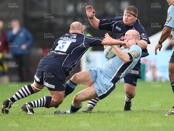 11.11.07 - Cardiff Blues v Bristol, Heineken Cup -  Blues' Tom Shanklin is high tackled by Bristol's Darren Crompton 