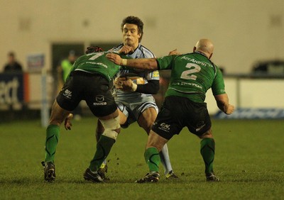 100212 Cardiff Blues v Connacht - RaboDirect PRO 12 -Blues' Chris Czekaj is tackled by Connacht's Ray Ofisa(L) and Adrian Flavin