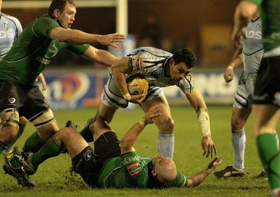 100212 Cardiff Blues v Connacht - RaboDirect PRO 12 -Blues' Casey Laulala charges through Connacht's Adrian Flavin as Michael Swift moves in 