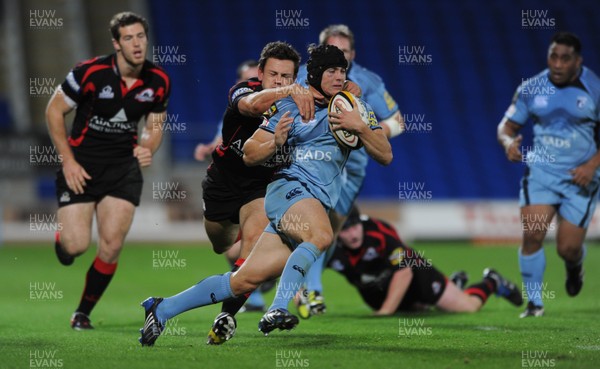 04.09.09 - Cardiff Blues v Edinburgh - Magners League - Leigh Halfpenny of Cardiff Blues is tackled by Nick De Luca of Edinburgh. 