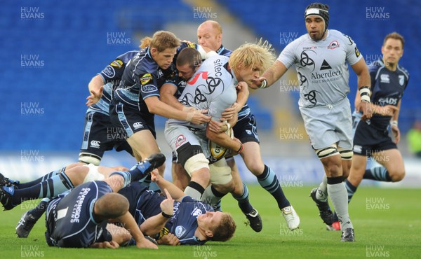 04.09.10 - Cardiff Blues v Edinburgh - Magners League - Scott MacLeod of Edinburgh is tackled by Richie Rees of Cardiff Blues. 