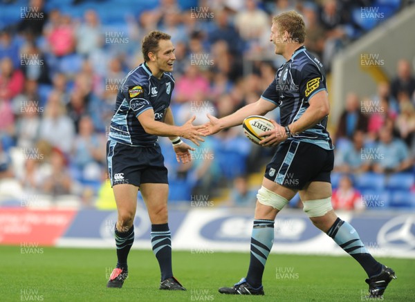 04.09.10 - Cardiff Blues v Edinburgh - Magners League - Bradley Davies of Cardiff Blues celebrates his try with Dan Parks(R). 