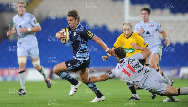 04.09.10 - Cardiff Blues v Edinburgh - Magners League - Chris Czekaj of Cardiff Blues is tackled by Tim Visser of Edinburgh. 