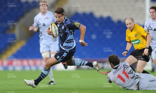 04.09.10 - Cardiff Blues v Edinburgh - Magners League - Chris Czekaj of Cardiff Blues is tackled by Tim Visser of Edinburgh. 