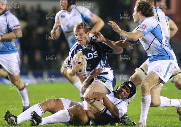 061012 Cardiff Blues v Glasgow Warriors - RaboDirect PRO 12 -Blues' Dan Fish is tackled by Glasgow's Ofa Fainga'anuku