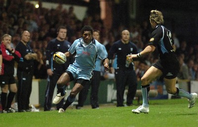 220906 - Cardiff Blues v Glasgow Warriors -  Magners League - Blues' Mosese Luveitasau looks for a way past Thom Evans 