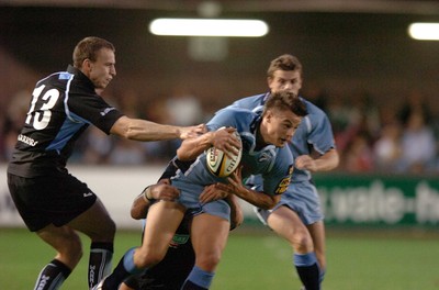 220906  Cardiff Blues v Glasgow  Chris Czekaj is tackled by Dan Parks and Andrew Henderson  