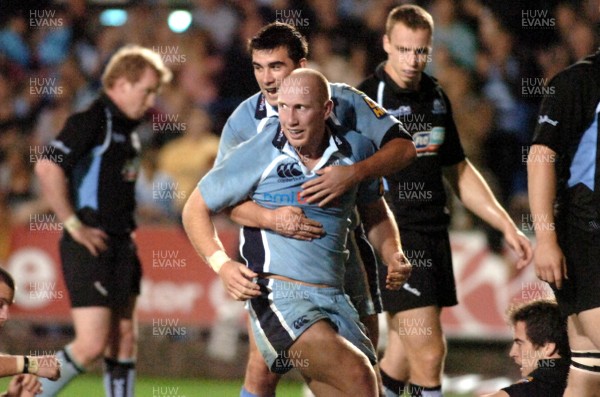 220906 - Cardiff Blues v Glasgow Warriors -  Magners League - Blues' Tom Shanklin is congratulated on try by Tom Riley 