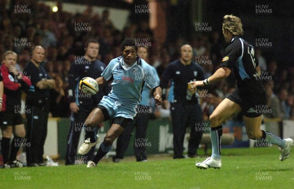 220906 - Cardiff Blues v Glasgow Warriors -  Magners League - Blues' Mosese Luveitasau looks for a way past Thom Evans 