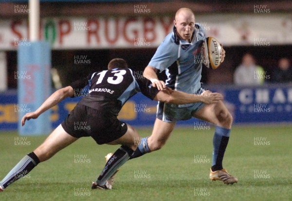 220906 - Cardiff Blues v Glasgow Warriors -  Magners League - Blues' Tom Shanklin takes on Andrew Henderson 