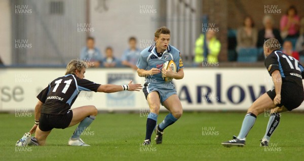 220906  Cardiff Blues v Glasgow  Ben Blair tries to get past Thom Evans  