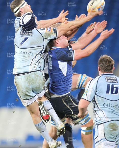 07.01.12 Cardiff Blues v Leinster... Blues' Gavin Evans and Sam Warburton get above Leinster's Jordi Murphy. 