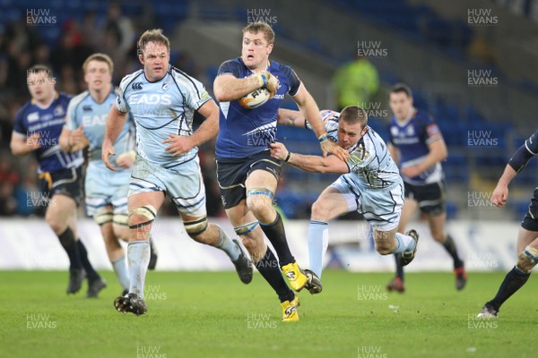 07.01.12 Cardiff Blues v Leinster... Leinster's Jamie Heaslip beats tackle by Richie Rees. 