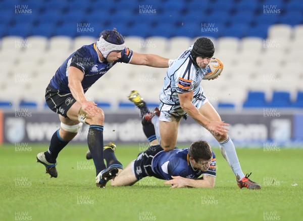 07.11.12 Cardiff Blues v Leinster... Blues' Leigh Halfpenny is tackled by Leinster's Gordon Darcy and Devin Toner. 