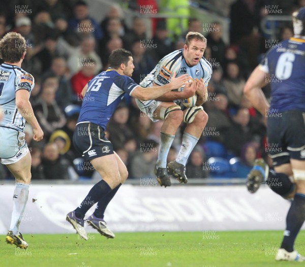 07.11.12 Cardiff Blues v Leinster... Blues' Xavier Rush collects under pressure from Leinster's Rob Kearney. 