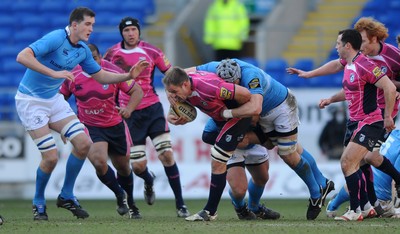 07.03.10 - Cardiff Blues v Leinster - Magners League - Xavier Rush of Cardiff Blues is tackled by Kevin McLaughlin of Leinster. 