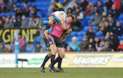 07.03.10 - Cardiff Blues v Leinster - Magners League - Shaun Berne of Leinster is dumped by Ceri Sweeney of Cardiff Blues. 