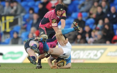 07.03.10 - Cardiff Blues v Leinster - Magners League - Shaun Berne of Leinster is dumped by Ceri Sweeney of Cardiff Blues. 