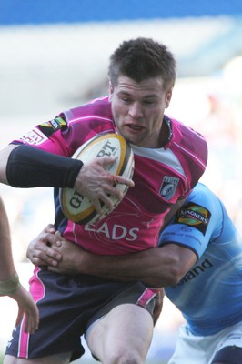 07.03.10 Cardiff Blues v Leinster - Magners League - Blues' Ceri Sweeney is tackled by Leinster's Isa Nacewa. 