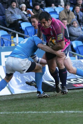 07.03.10 Cardiff Blues v Leinster - Magners League - Blues' Gary Powell brushes off Leinster's Girvan Dempsey to score. 