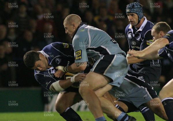 28.09.07  Cardiff Blues vs. Leinster. Magners League. Cardiff Arms Park, Cardiff. 
 
Stan Wright drives through Gary Powell(hidden) & John Yapp's tackles. 
 
Darren Griffiths/