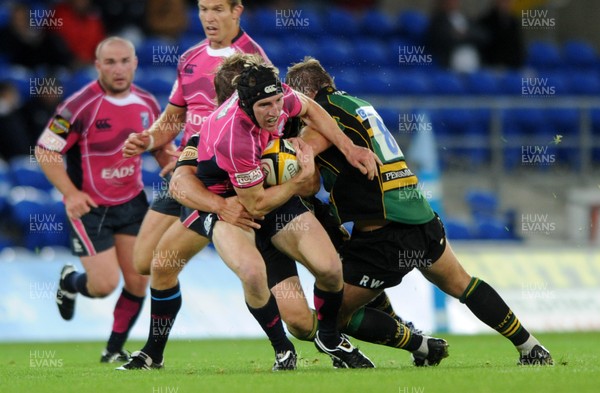 28.08.09 - Cardiff Blues v Northampton Saints - Pre-Season Friendly - Sam Norton-Knight of Cardiff Blues is tackled by Roger Wilson of Northampton. 