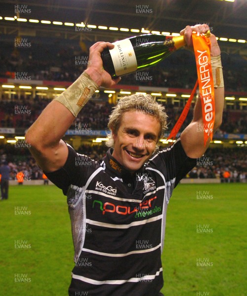 24.03.07 -  Ospreys v Cardiff Blues - EDF Energy Cup Semi-Final - Ospreys Man of the Match, Justin Marshall celebrates victory 