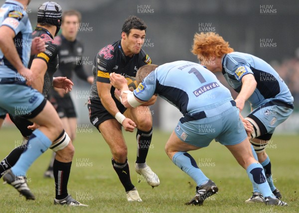 31.12.08 - Cardiff Blues v Ospreys - Magners League - Ospreys Mike Phillips is tackled by Gethin Jenkins 