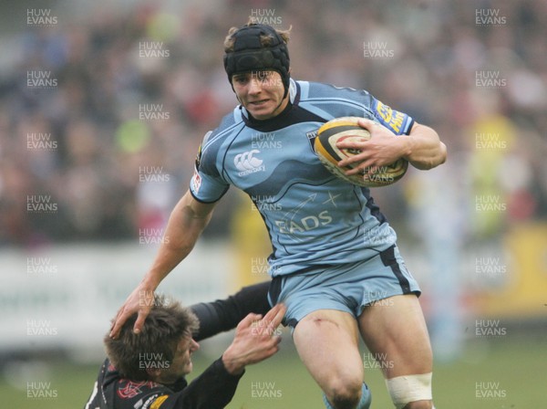 31.12.08  Cardiff Blues v Ospreys... Blues' Leigh Halfpenny is tackled by Dan Biggar. 