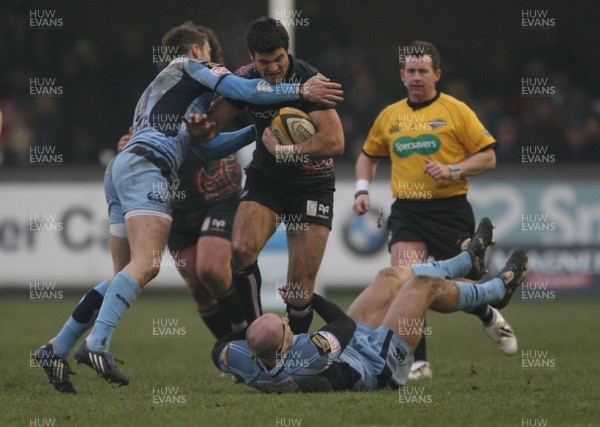 31.12.08  Cardiff Blues v Ospreys... Ospreys Mike Phillips is tackled by Gareth Thomas and Nicky Robinson. 