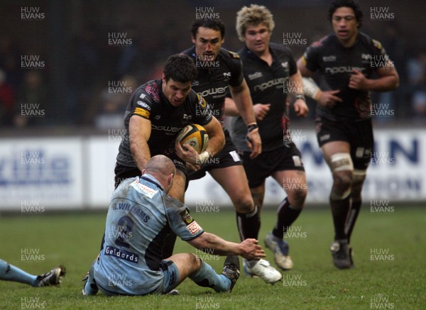 31.12.08  Cardiff Blues v Ospreys... Ospreys Mike Phillips is tackled by Gareth Williams. 