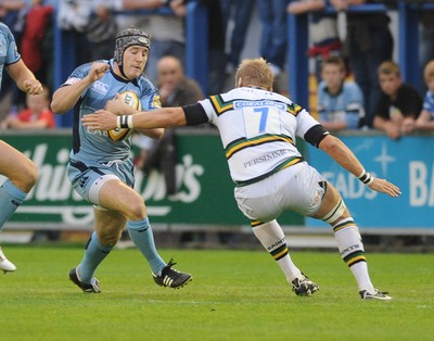 29.08.08 - cardiff Blues v Northampton Saints Blues' Roger Davies tries to get past Ben Lewitt 