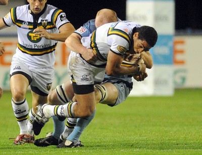 29.08.08 - cardiff Blues v Northampton Saints Northampton's Joe Ansbro is tackled by Martyn Williams 